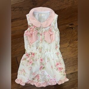 Dollcakes floral romper
Size Girls 5